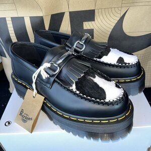 Dr. Martens Black Leather Platform Kiltie Loafers with Cow Print